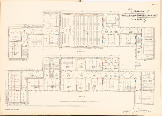 Open book displaying a detailed floor plan of the Berlin Olympic Gymnasium with accompanying text describing its layout.