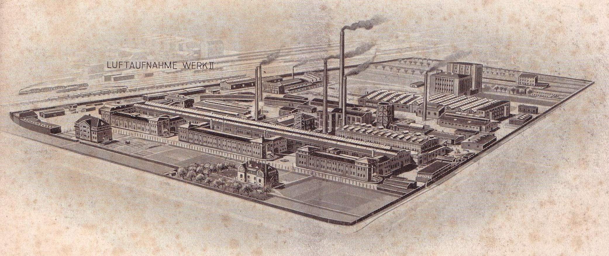 Black and white aerial drawing of a German city with varied buildings, green trees, and chimneys emitting smoke, labeled "Luftaufnahme Werkt, Germany."