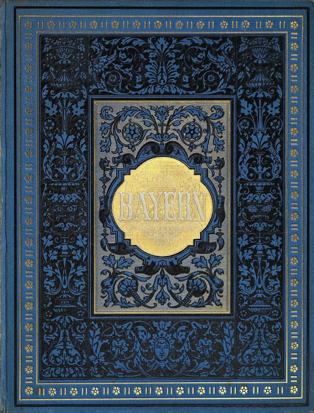 A blue and gold book with the word "Bayern" on its cover, featuring intricate decorative designs.