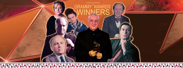 Group of people on a stage holding an award, celebrating at the Grammy Awards Winners event.