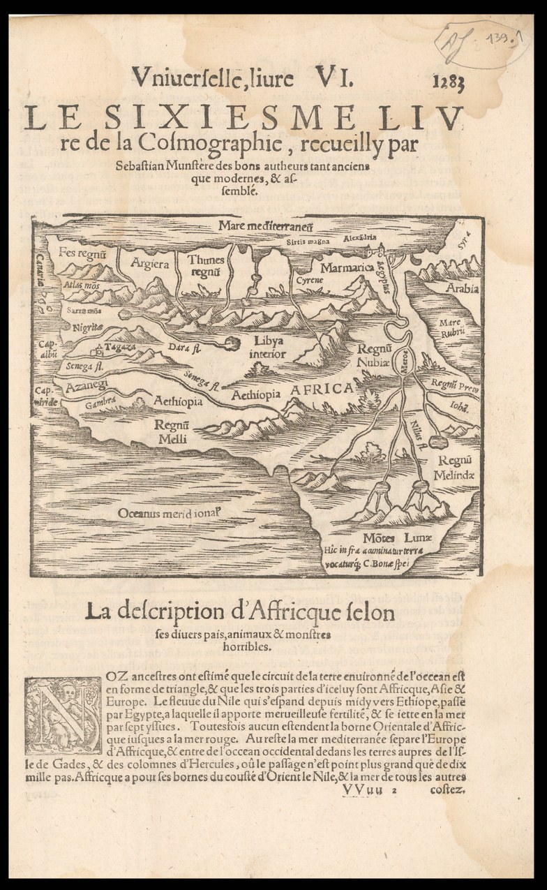 Old book with a detailed map of Africa on its cover, including geographical features like mountains, rivers, and cities, against a black background.