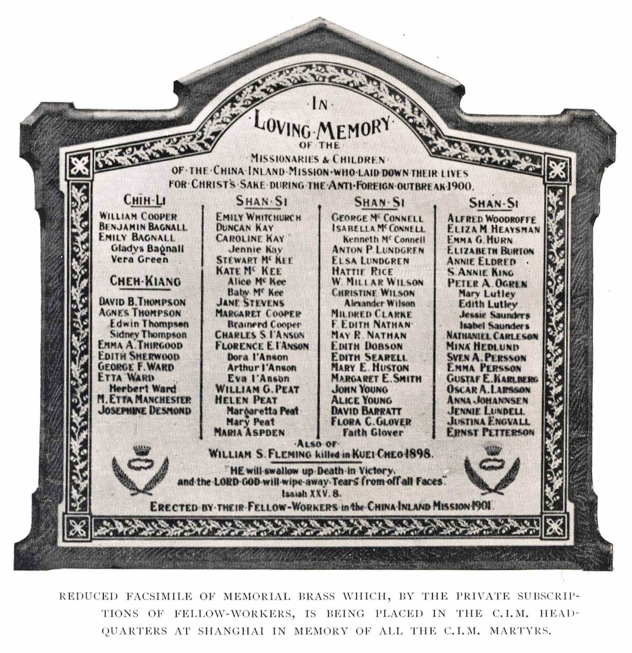 Black and white photo of a memorial plaque with the words "Loving Memory" inscribed on it.