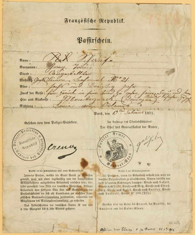 Ein altes, gelbliches Dokument mit einem kreisförmigen, schwarz umrandeten Stempel, enthält schwarzen Text in Schwarzschrift, wahrscheinlich ein Schreiben der deutschen Regierung.