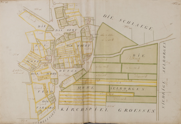 Old book with a detailed map of Hamburg, Germany, showing streets, buildings, and landmarks, accompanied by descriptive text.